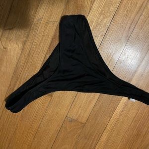 Size medium. Extra cheeky bathing suit bottom